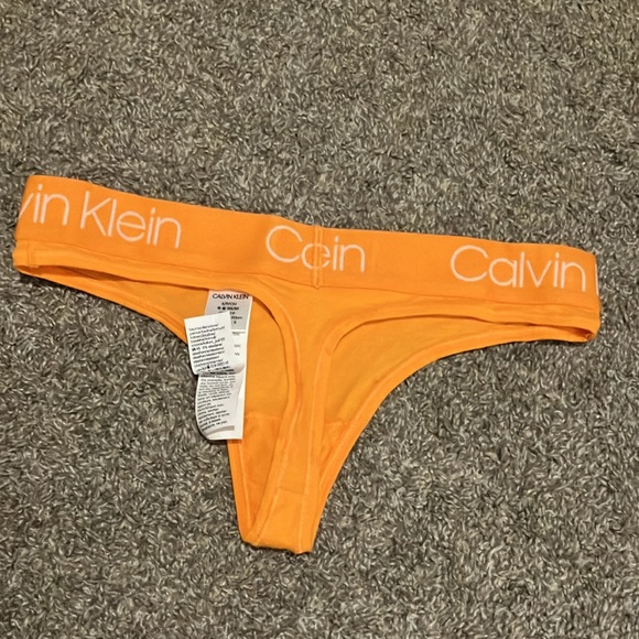 NWOT Calvin Klein Orange Thong Panty size Small - Picture 4 of 4